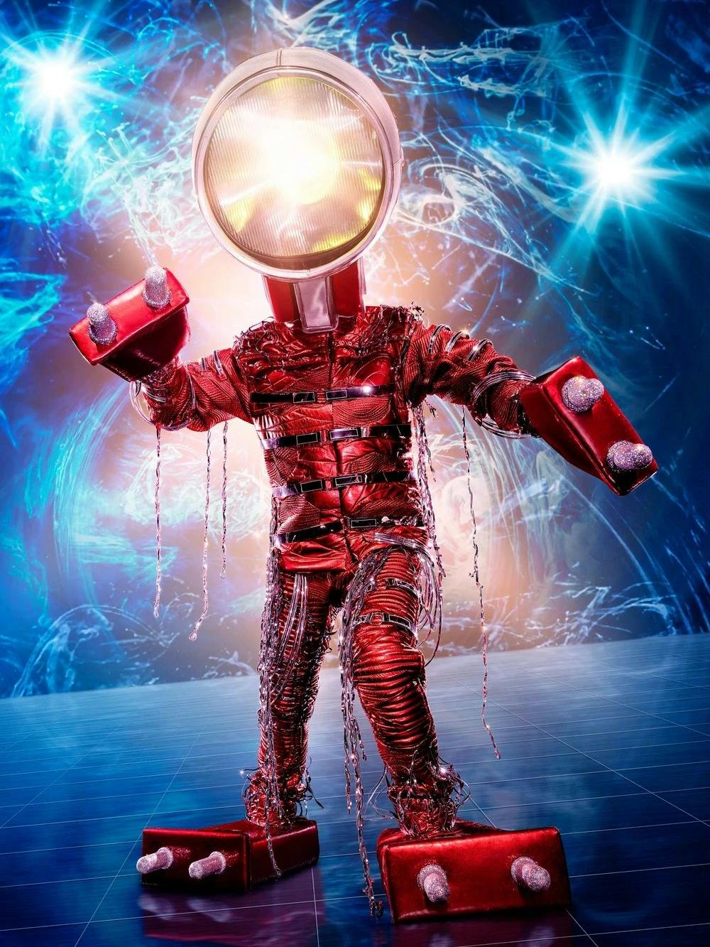 In der belgischen Variante von The Masked Singer steht diese Warnleuchte auf der Bühne.