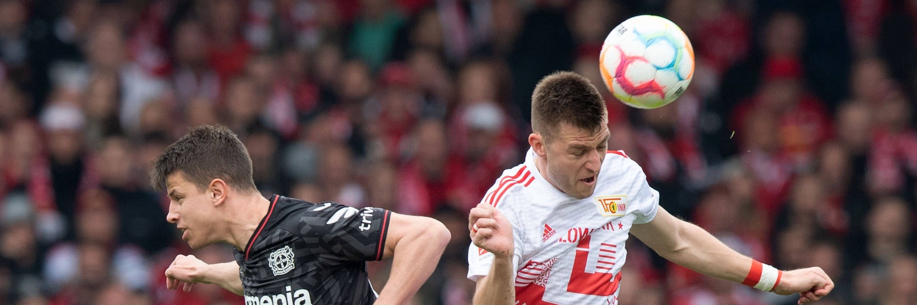 Robin Knoche (r.) - hier im Luftduell mit Adam Hlozek – war vor allem mit der Abwehrleistung des 1. FC Union zufrieden nach dem 0:0 gegen Bayer Leverkusen.