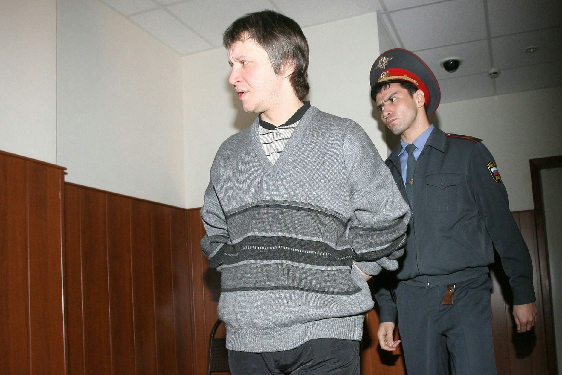 Pitschuschkin auf dem Weg zu seiner Gerichtsverhandlung