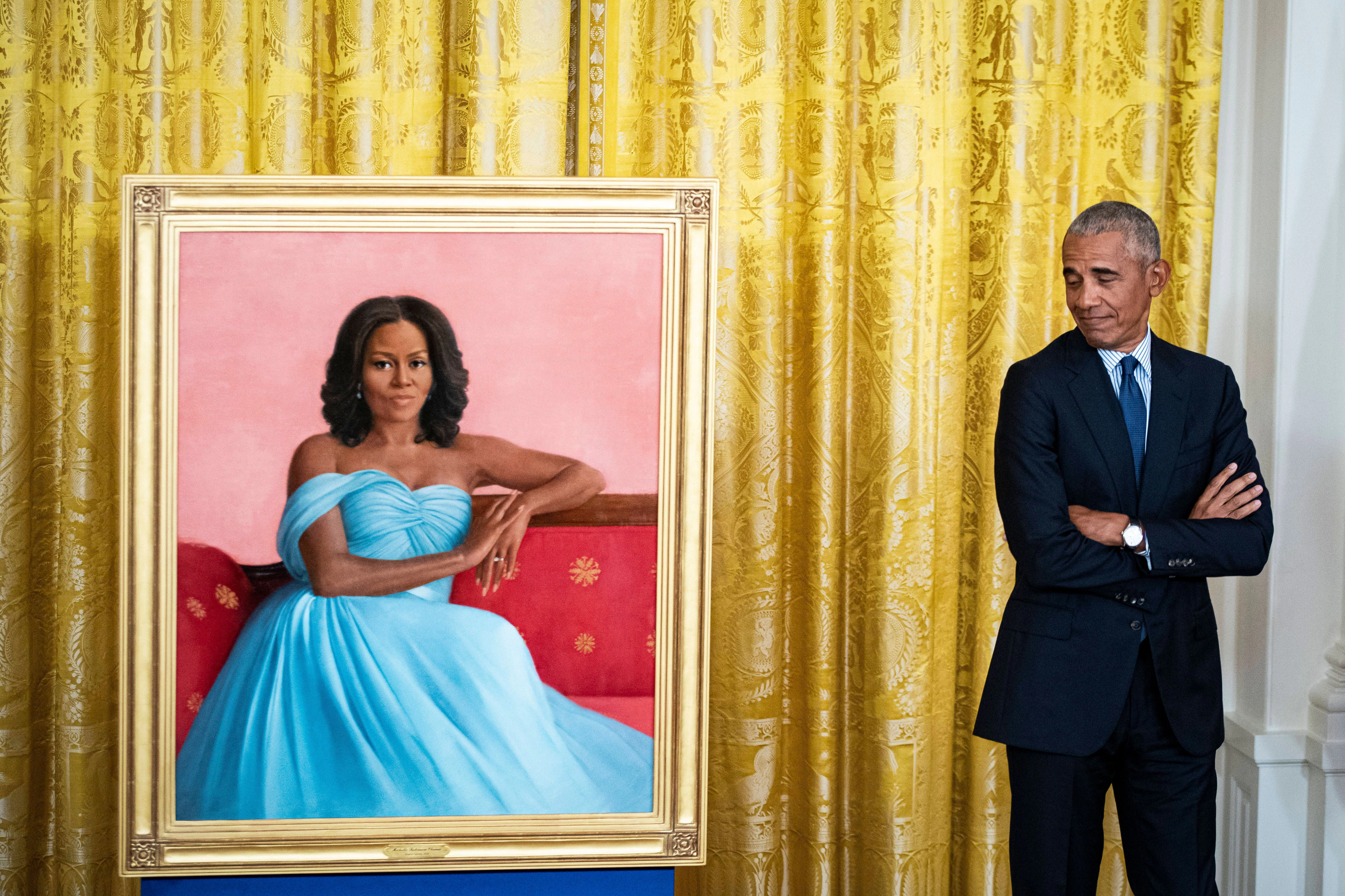 Hat für seine Frau aufgehört: Barack Obama im vergangenen Jahr neben einem Gemälde seiner strengen Gattin.