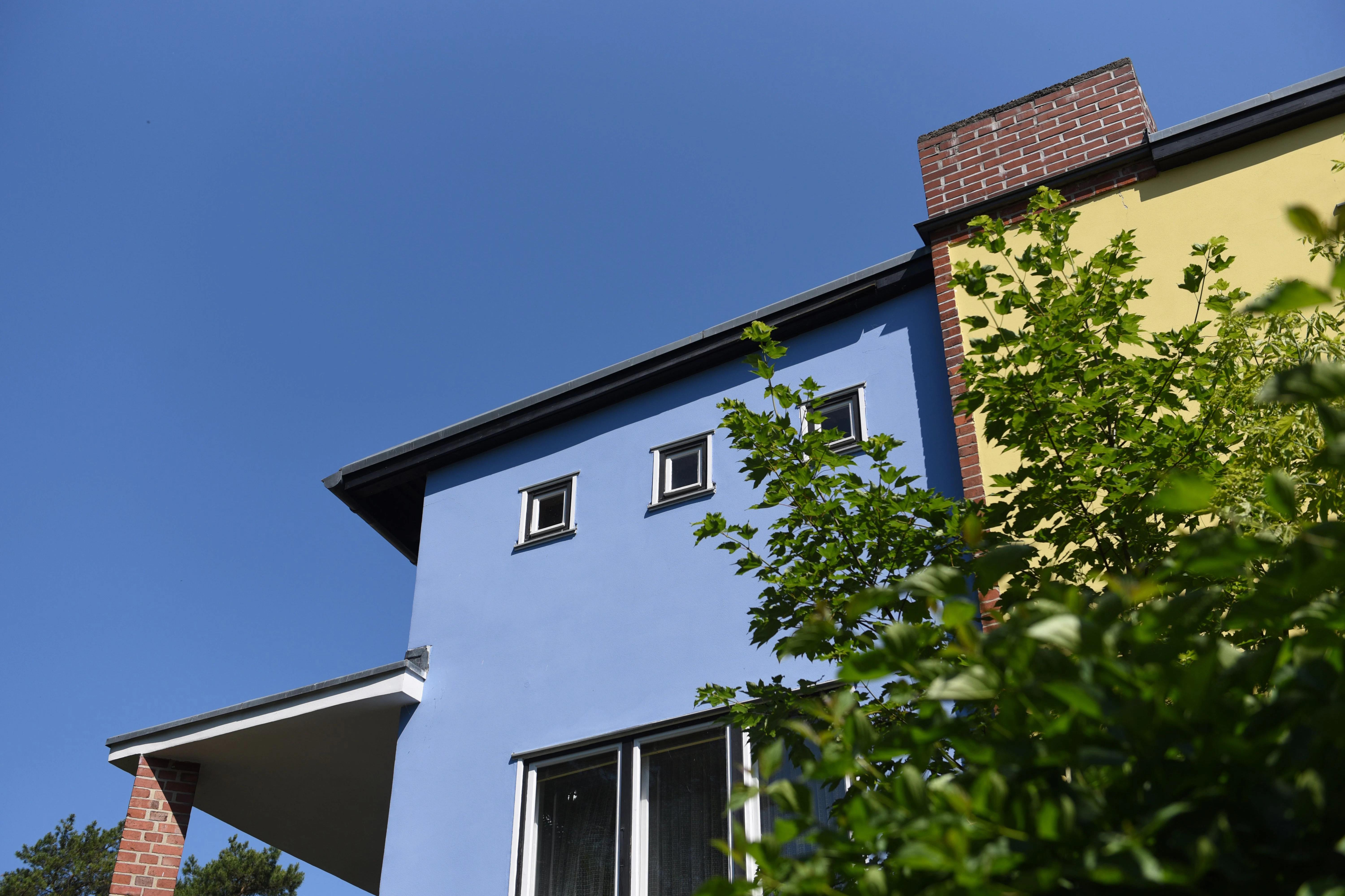Farbig durchgestaltete Fassaden: Verächter des Neuen Bauens schmähten sie einst als Papageiensiedlung, heute verwenden die Bewohner den Begriff eher liebevoll.