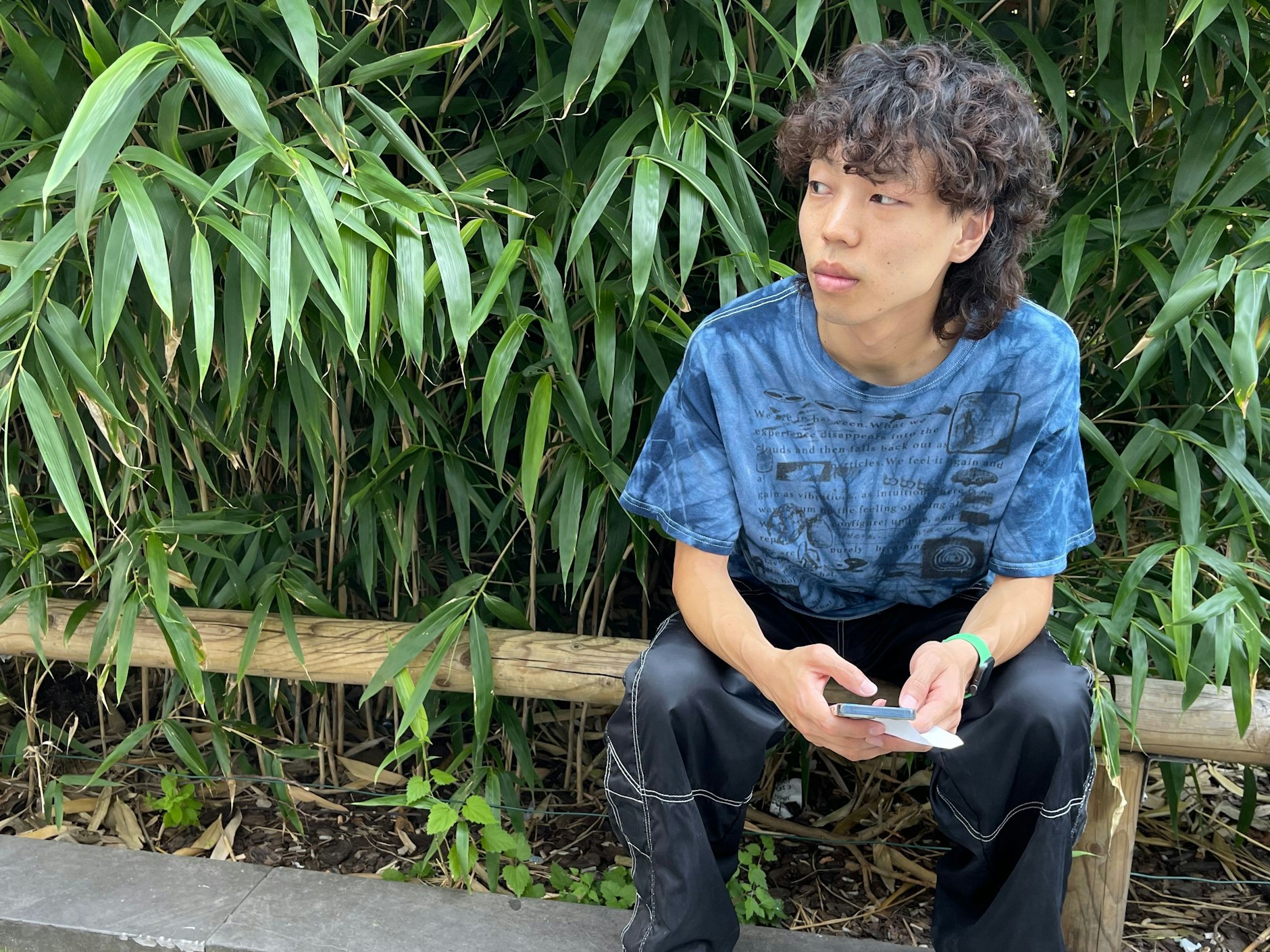 Atsushi wartet mit prächtigem Mullet auf sein Sandwich von Banh mi Stable.&nbsp;