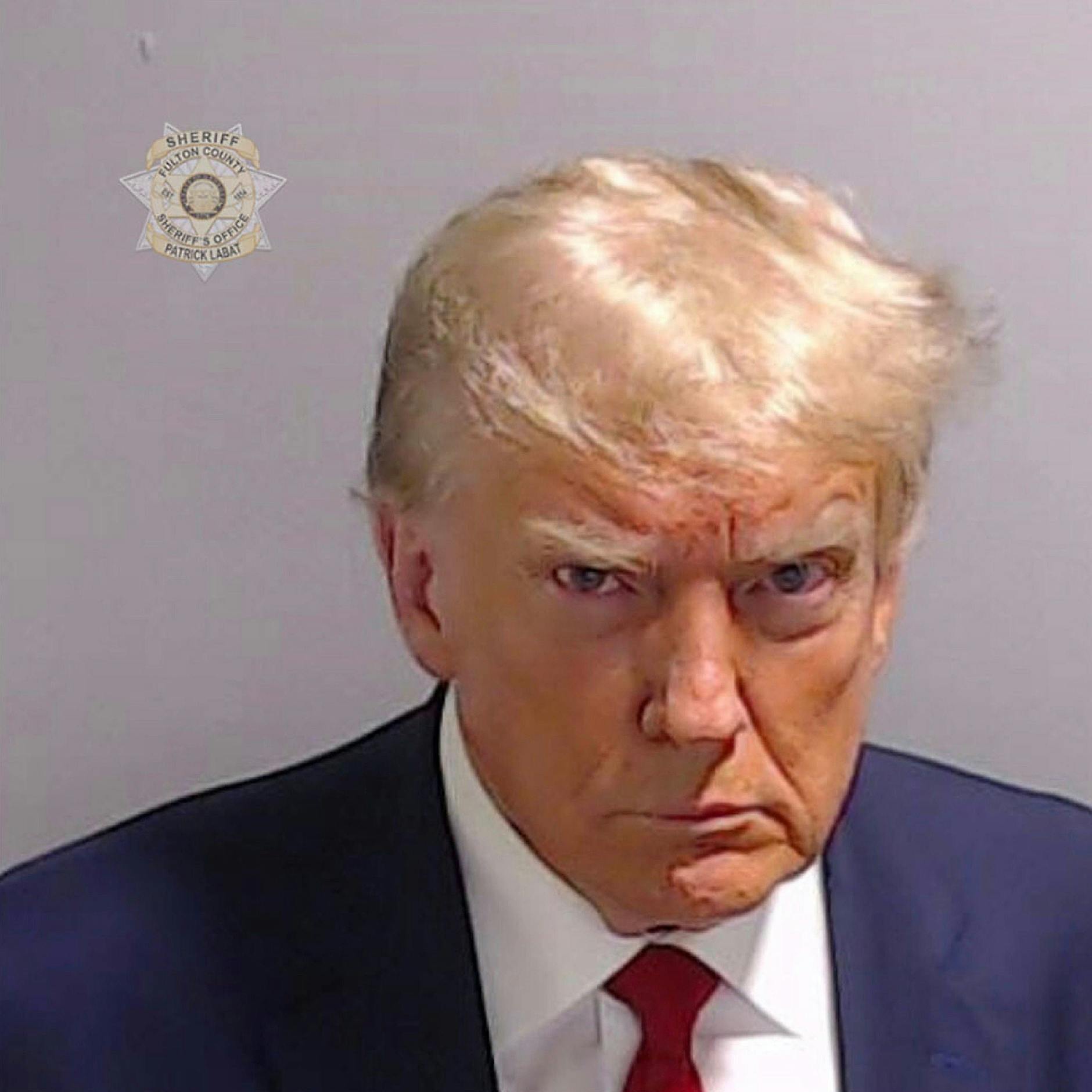 Trumps Mugshot ist doch nur ein Foto!