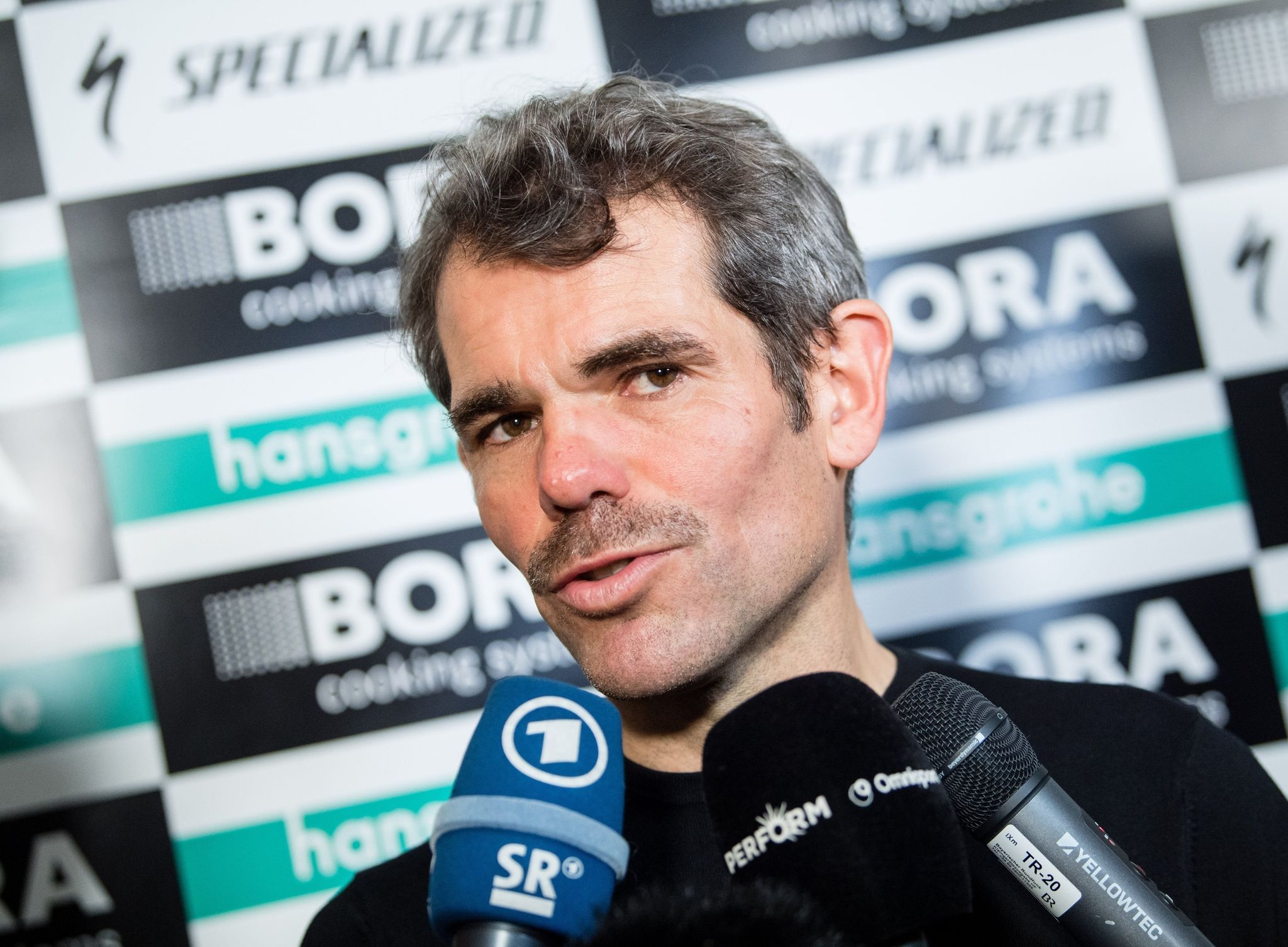 Image - Sponsoren aus Mittleren Osten: Denk sieht Ungleichgewicht