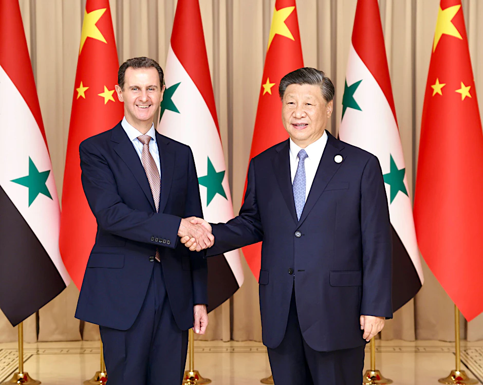 Der chinesische Präsident Xi Jinping (r.) trifft den syrischen Präsidenten Baschar al-Assad.