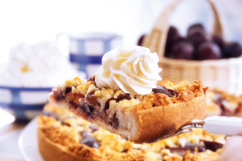 Rezept für Pflaumenkuchen mit Pudding und Streuseln: Lecker wie von Oma!