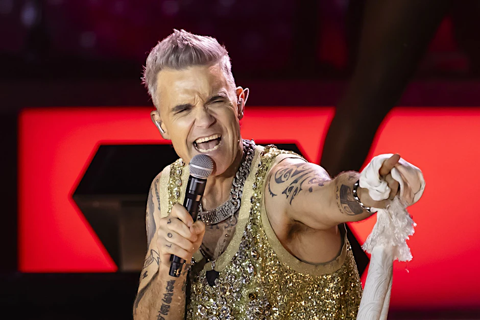 ARCHIV - Der britische Sänger Robbie Williams hat sich in Essen angesagt.  