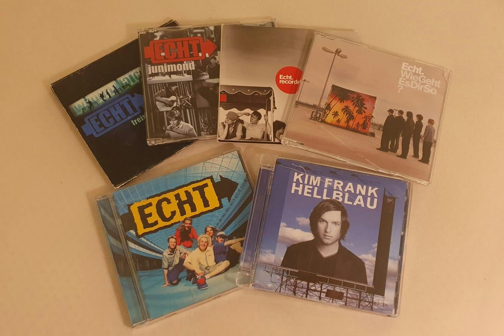 Meine CD-Sammlung mit fünf Echt-CDs und dem Soloalbum von Kim Frank.