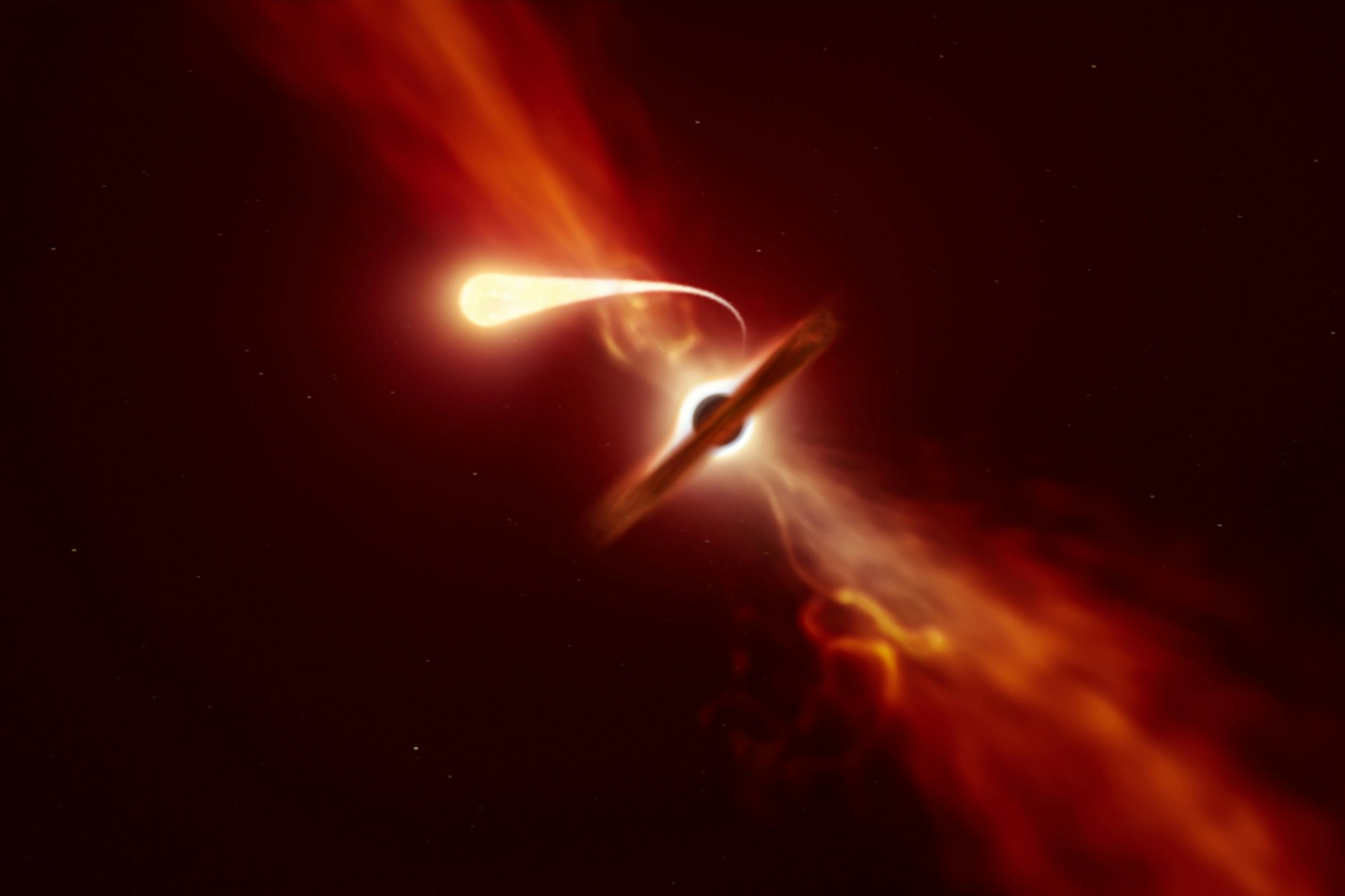 Die Grafik zeigt einen Stern, der von einem supermassiven Schwarzen Loch angesaugt wird.