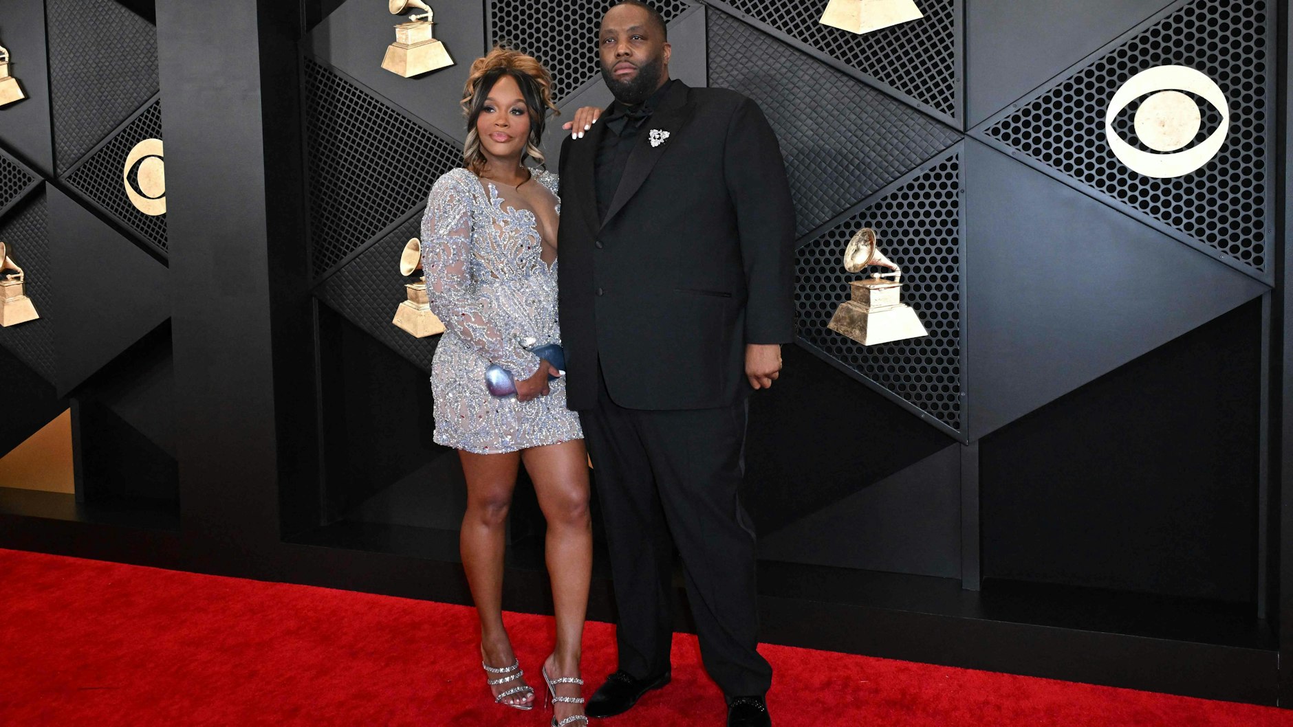 Killer Mike mit seiner Frau auf dem roten Teppich bei der Grammy-Preisverleihung. Noch vor der Gala wurde er in Handschellen abgeführt.