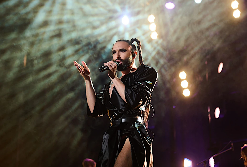 ARCHIV - Conchita Wurst bei einem Benefiz-Konzert in der Mercedes-Benz-Arena 2023.  