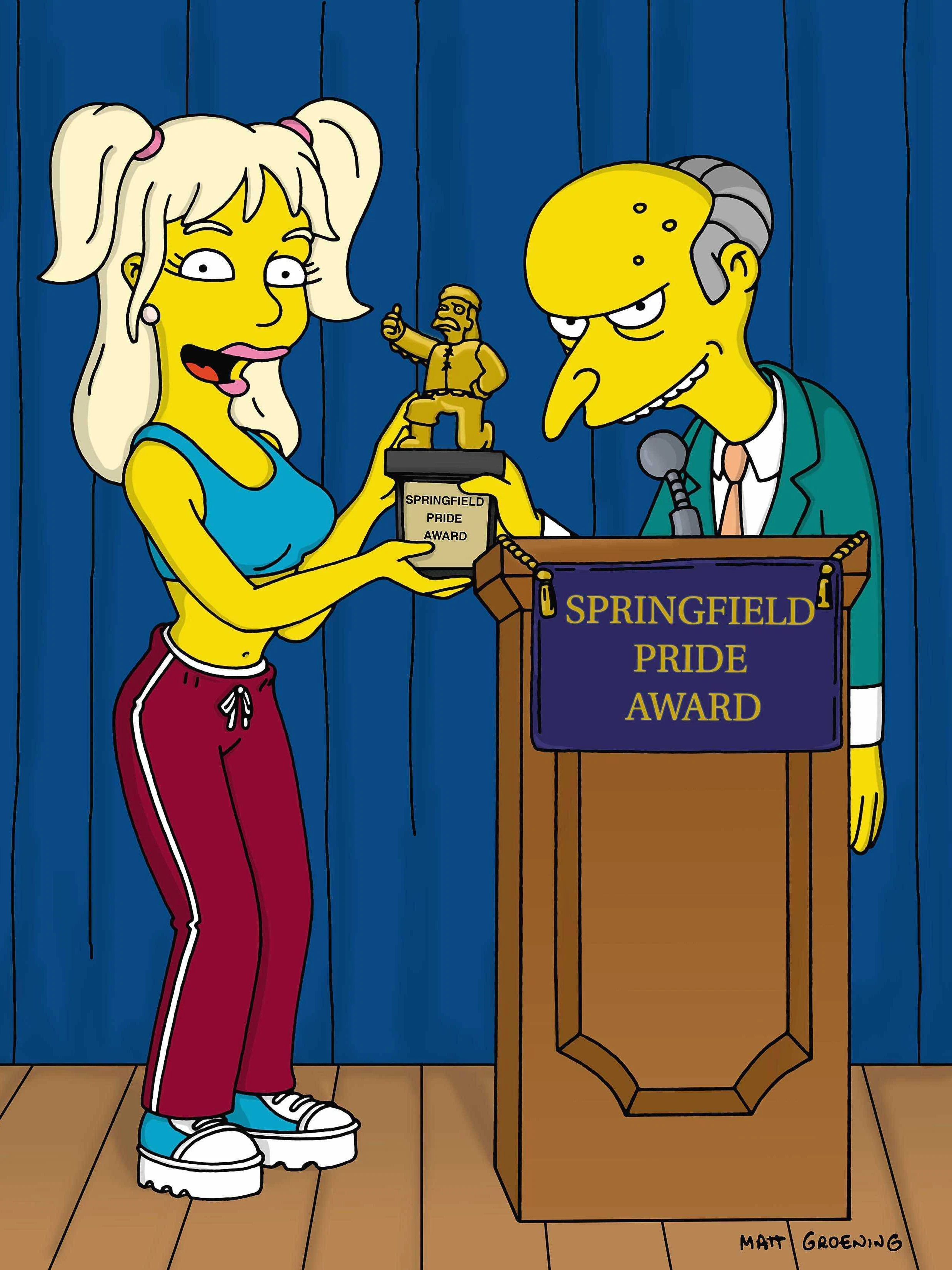 Britney Spears überreicht Geizhals Mister Burns eine Auszeichnung der Stadt Springfield.
