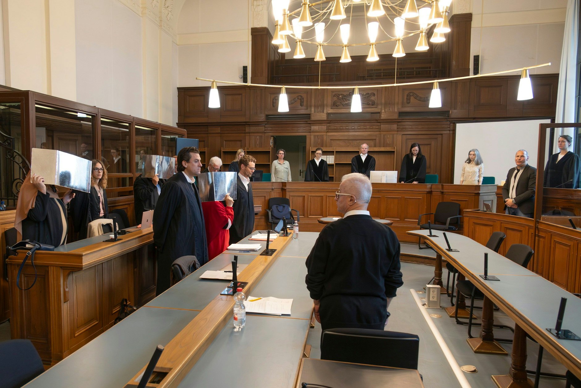 Die drei Mitglieder der angeklagten Familie stehen seit Dienstag in Berlin vor Gericht.