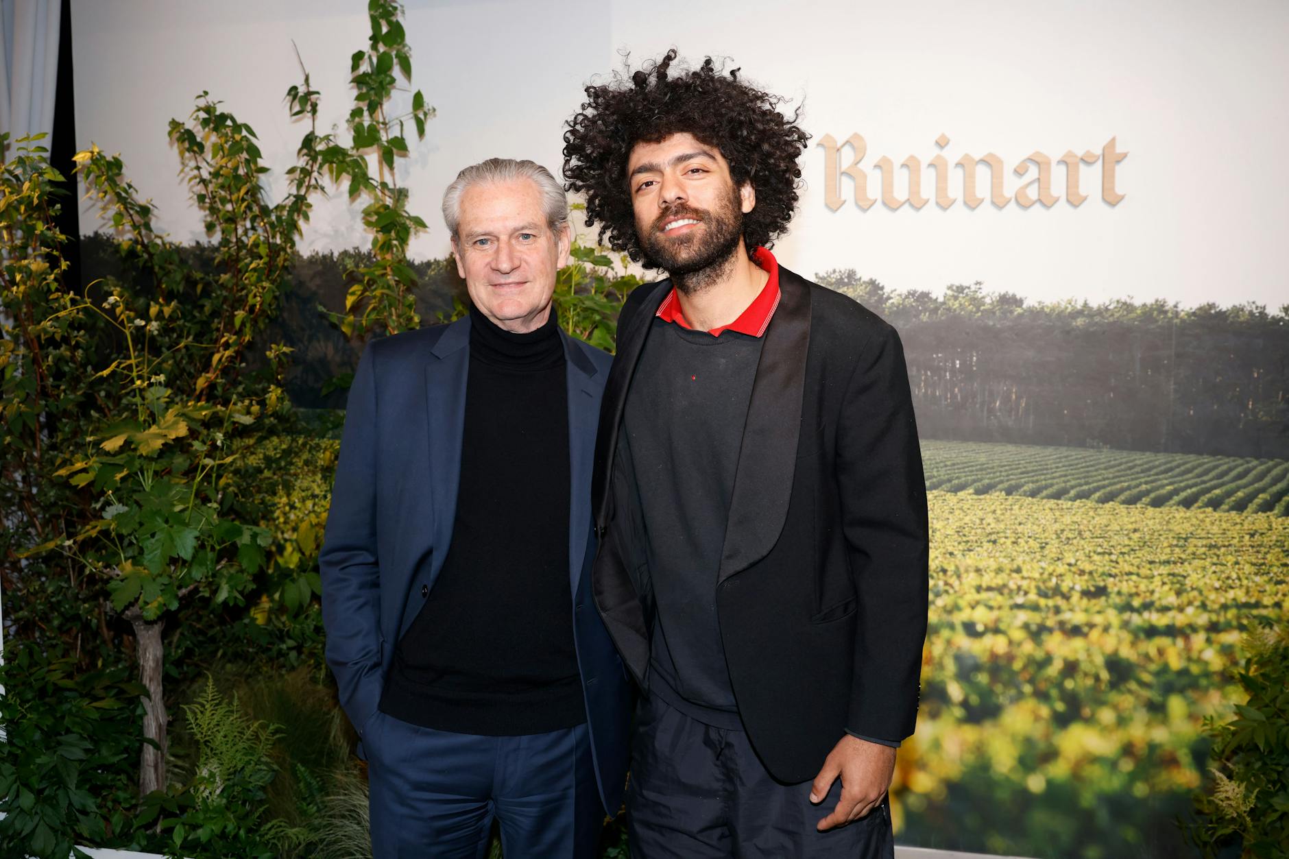 Noah Becker und Ruinart-Chef Frédéric Dufour bei der Eröffnung in Berlin-Mitte.