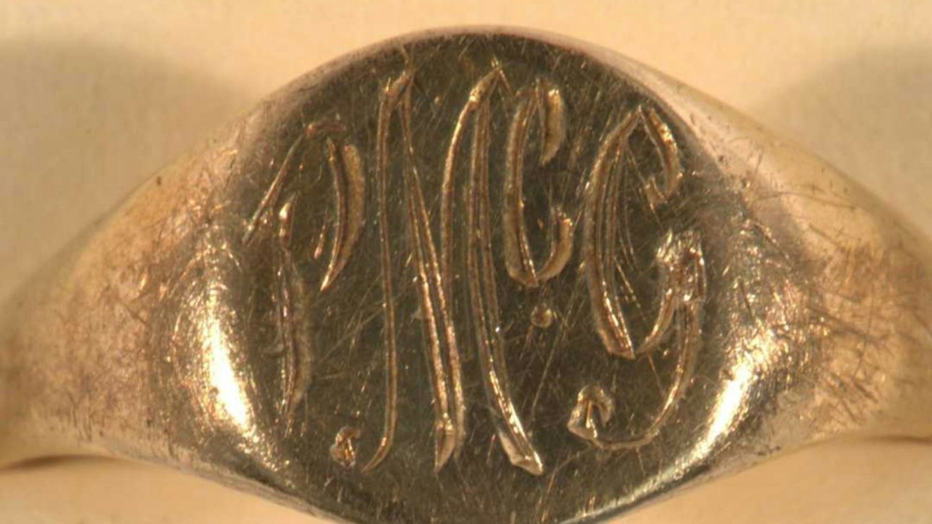 The signet ring found on the remains of Patricia McGlone, with her initials PMcG.