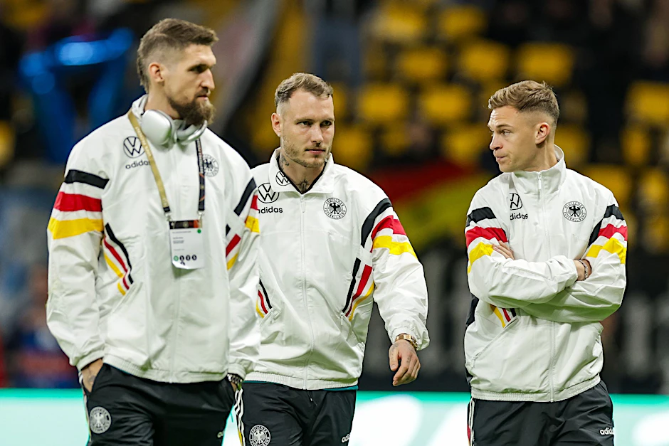 Deutschlands Spieler Robert Andrich (l-r), David Raum und Joshua Kimmich.  