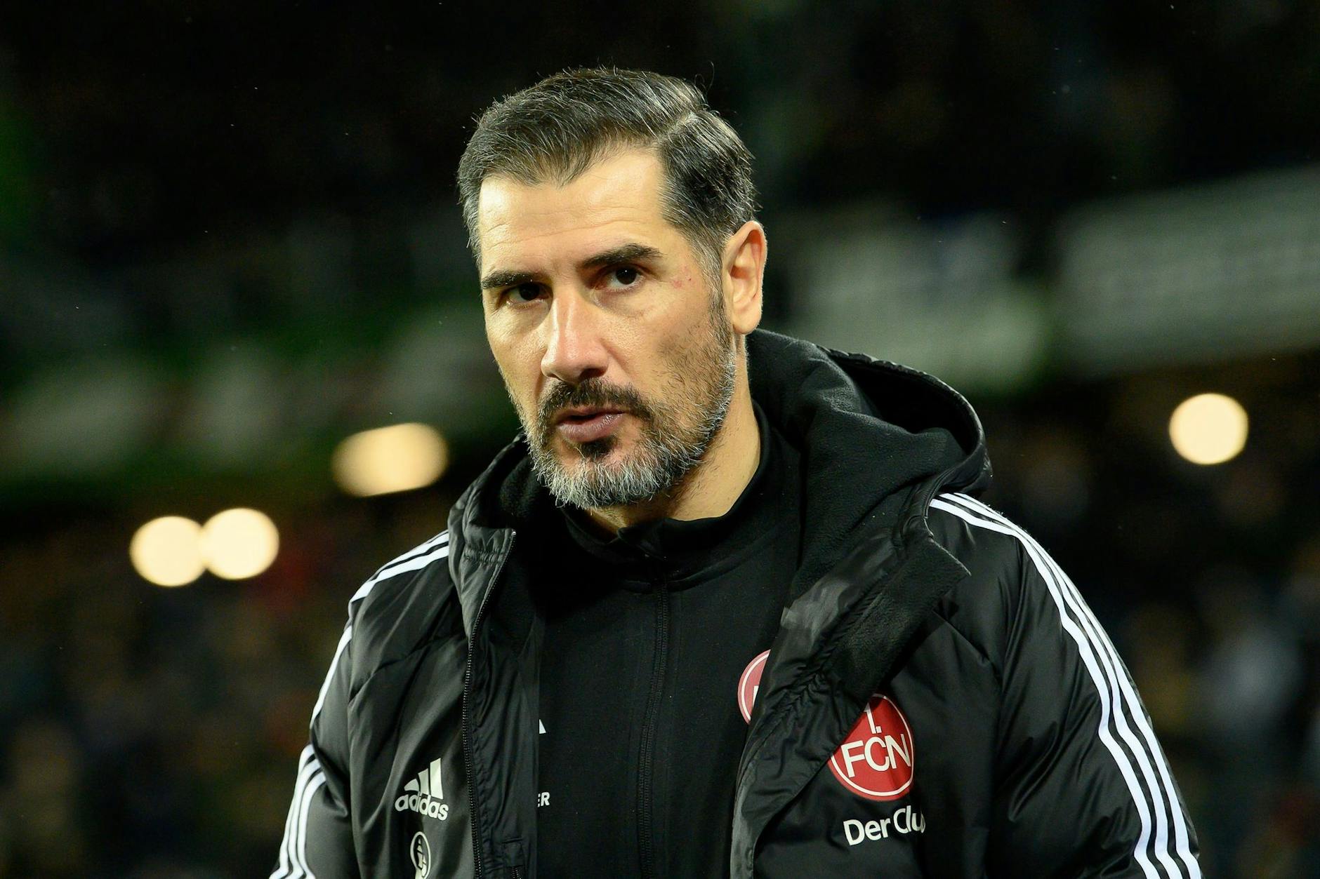 ARCHIV - Nürnbergs Trainer Christian Fiel ist vor dem Spiel im Stadion.