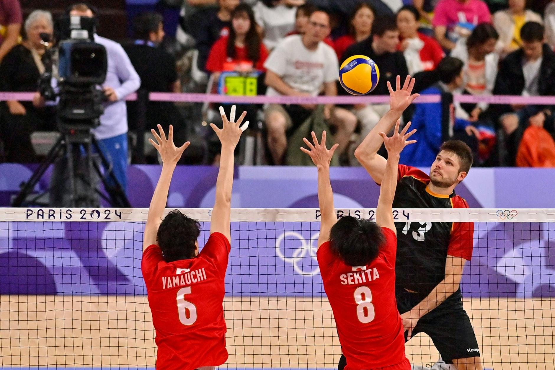 In Aktion: Deutschlands Ruben Schott (hinten) gegen die Japaner Akihiro Yamauchi und Masahiro Sekita.