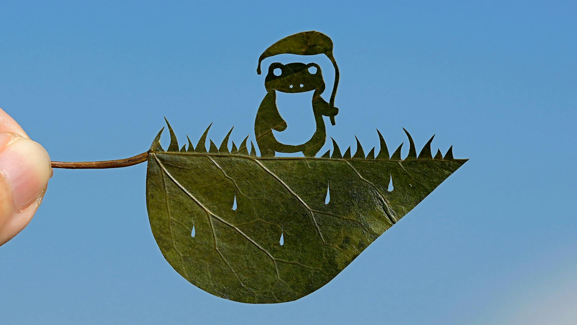 Ein Frosch mit Regenschirm ist eines der neuesten Werke von Lito.