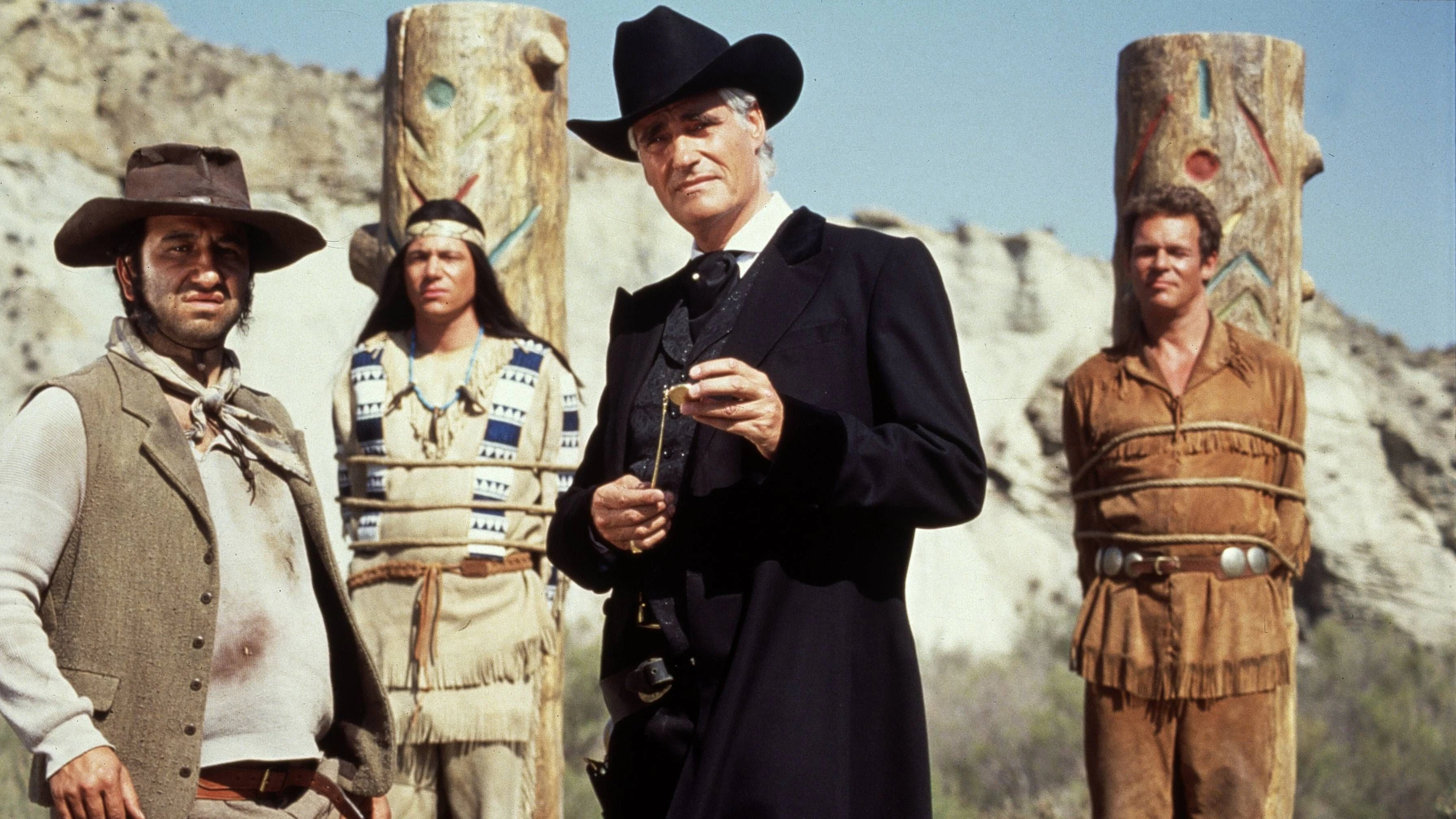 Santa Maria (Sky Dumont), sein Sklave Hombre (Hilmi Sozer), Abahachi (Michael „Bully“ Herbig) und sein Blutsbruder Ranger (Christian Tramitz) in einer Szene des Films „Der Schuh des Manitu“.