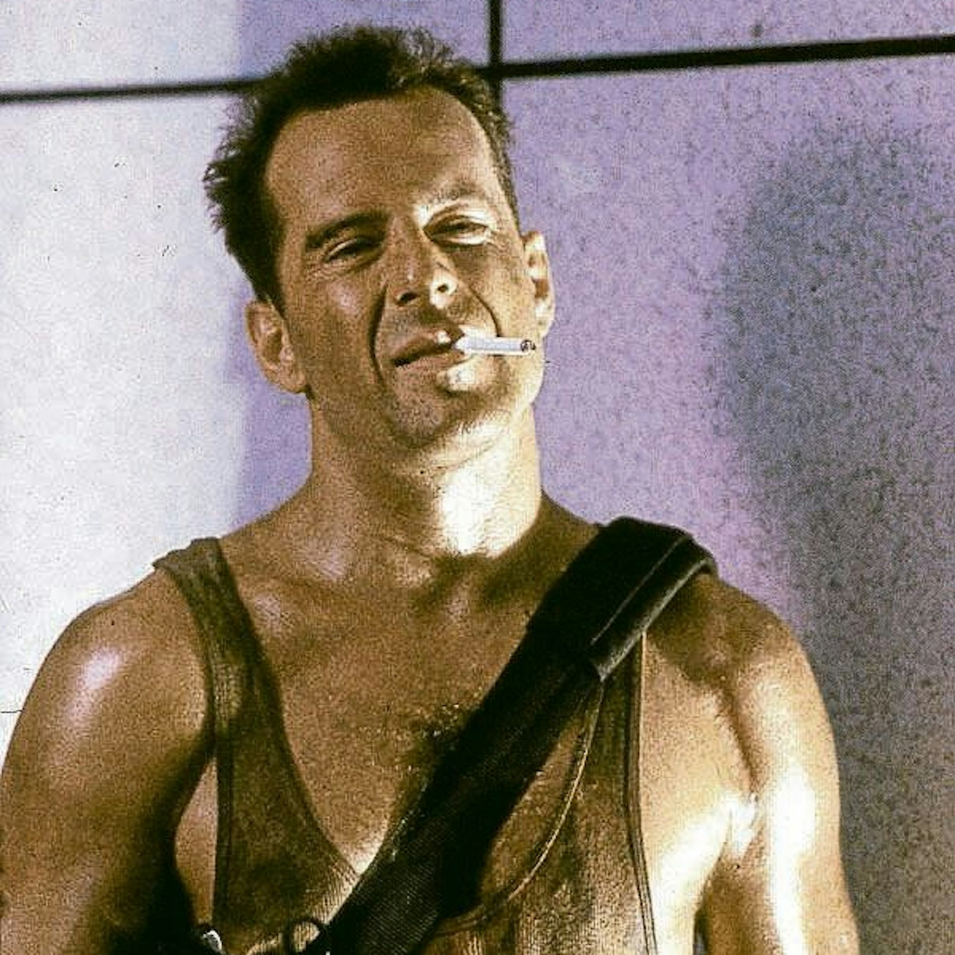 Bruce Willis in seiner Paraderolle als Officer John McClane im Film „Stirb langsam“ aus dem Jahr 1988