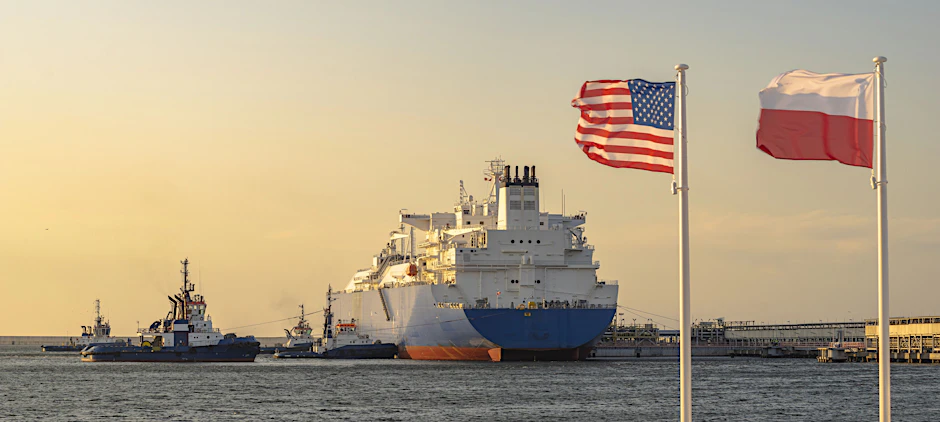 The US and Polish Flags and the American LNG tanker during the supply of liquefied gas to the LNG terminal in winoujcie in Poland