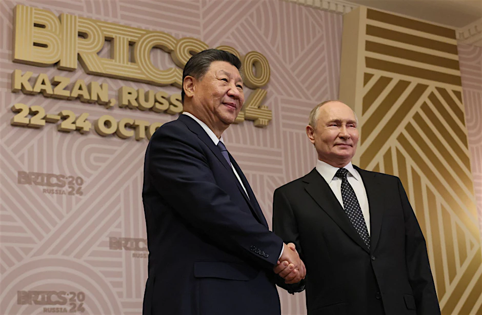 Der russische Präsident Wladimir Putin (r) und der chinesische Präsident Xi Jinping 