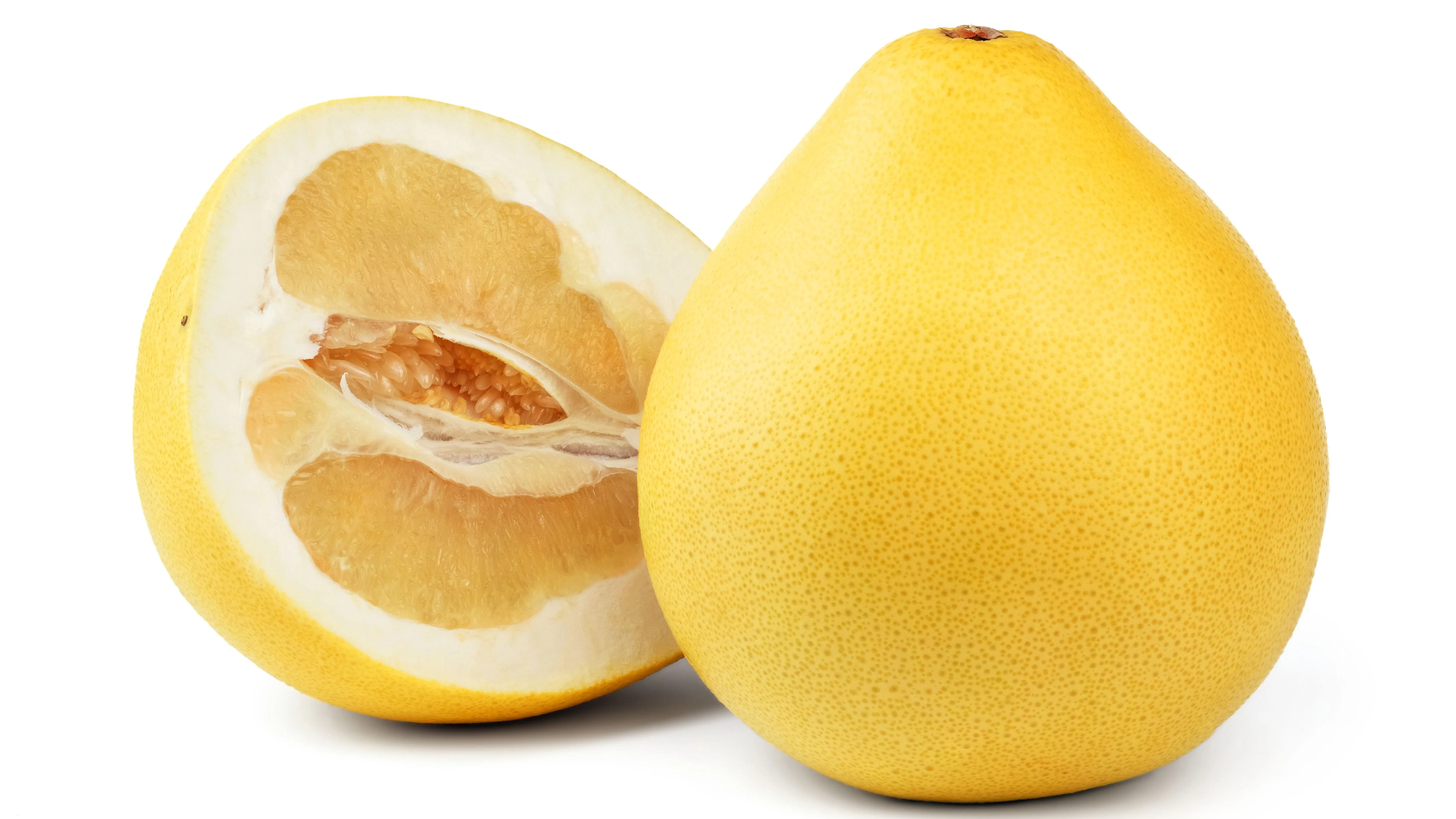 Pomelo - Zitrusfrucht mit dicker Schale und weichem Kern.