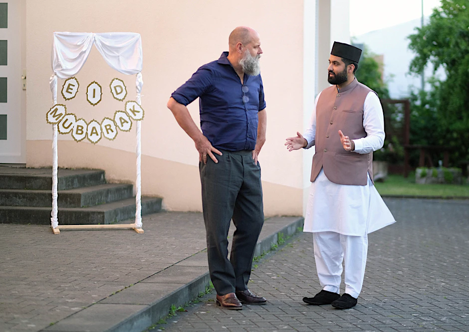 Im Gespräch:  Imam Scharjil Khalid und Verleger Holger Friedrich.