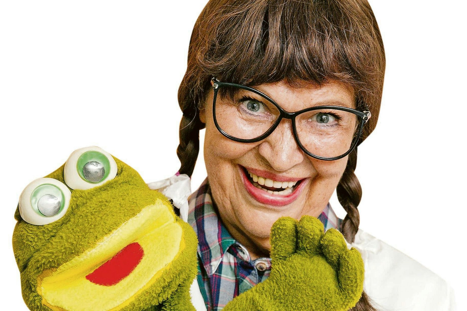 Schauspielerin Urte Blankenstein als Puppendoktor Pille und ihrem Bühnenpartner Frosch Quaki