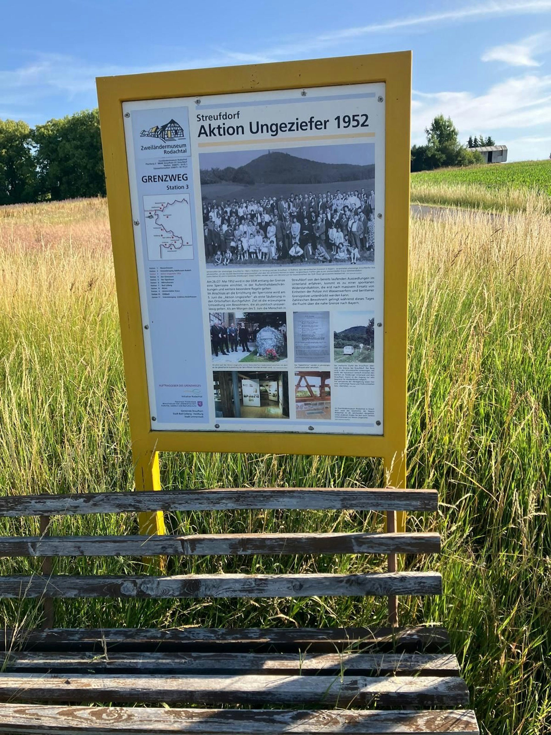 A sign on the roadside near Streufdorf commemorates the forced relocation of residents from border villages. The state called it 